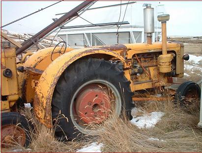 Go to two yellow 1955 Minneapolis Moline GB Diesel tractors for sale $3,500 