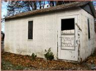 1912 Rusk Auto House 12' X 18' Prefabricated Car Garage For Sale door and window side view