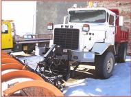 1988 FWD Model RB44-2312 4X4 semi snow plow with dump bed and spreader left front view